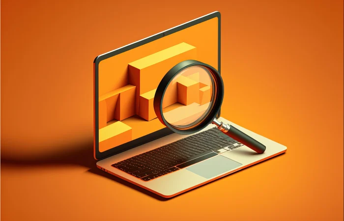 Laptop og forstørrelsesglass for å illustrere søkemotoroptimalisering og core web vitals